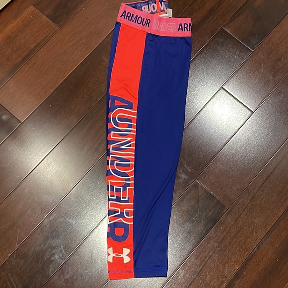 Blue and pink children’s Under Armour capri-styled leggings. - Picture 3 of 4